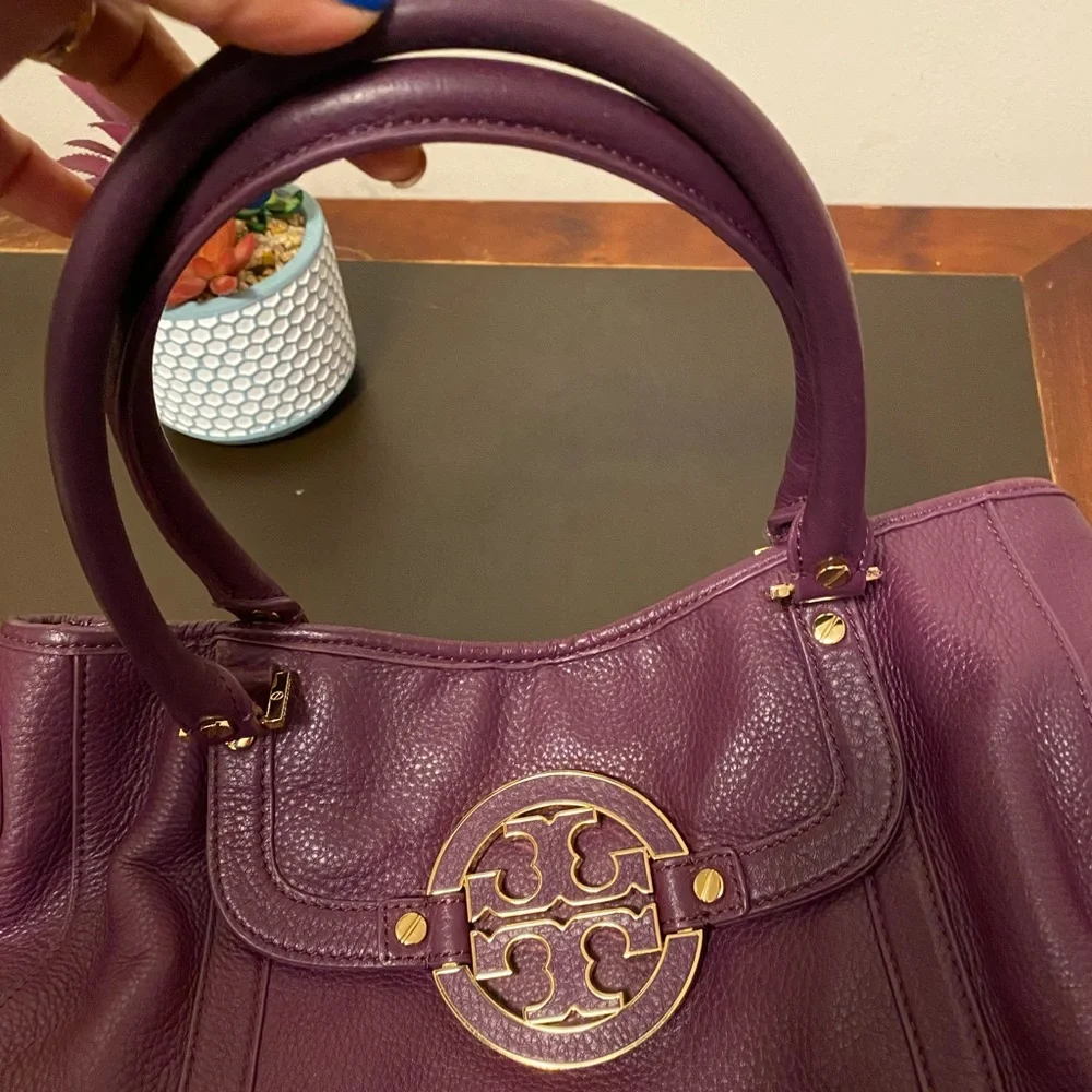 Tory Burch purple bag.